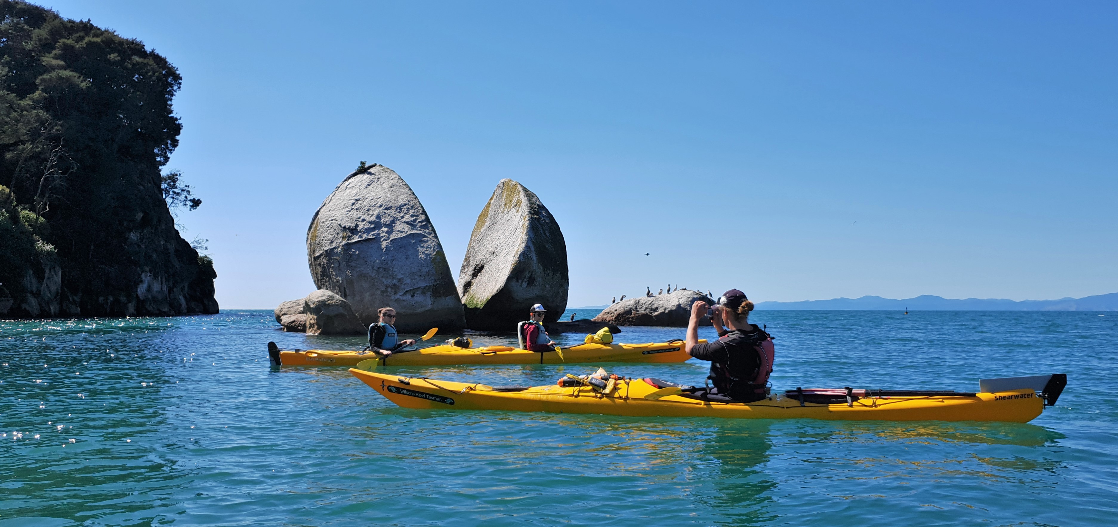 Kayak to Split Apple Rock. Cruise into Tonga Island Marine Reserve.